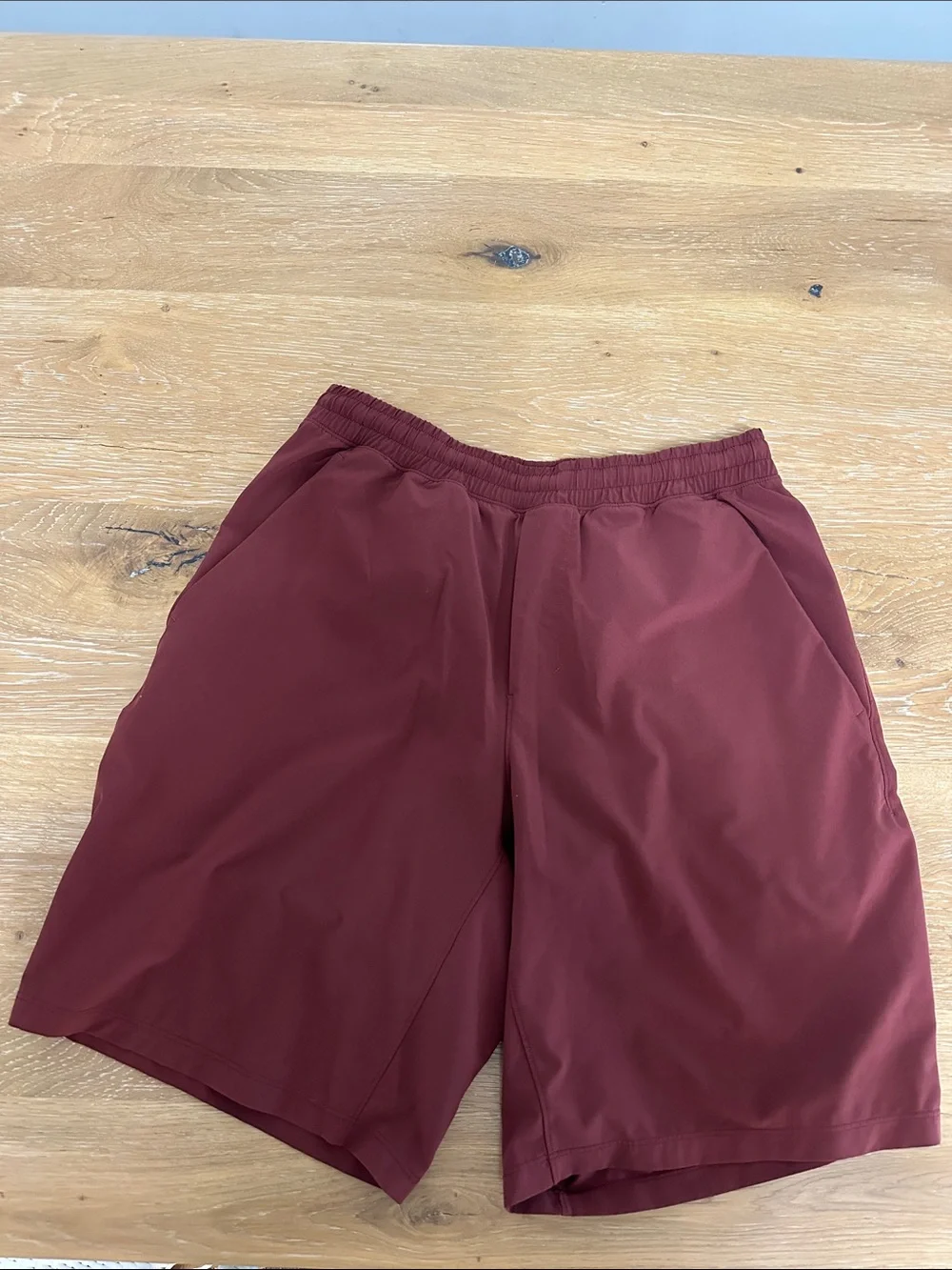 Lululemon mens athletic shorts. Dark red. Size medium